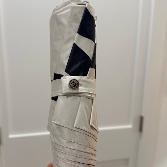 CC Cream and Black Printed Camellia Flower Umbrella - Picture 4 of 12